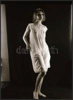 cca 1972 Ledér hölgyek ruhában és anélkül, szolidan erotikus felvételek, 10 db vintage negatív, 24x3...