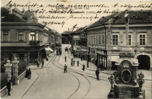 1913 Újvidék, Neusatz, Novi Sad; Duna utca, villamos, Kőkereszt, sírkőraktár, Ivkovic Milán és Dietzgen Sohne üzlete/ street, shops, tram