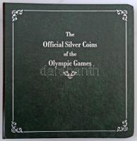 Zöld műbőr kapcsos érmeberakó album Az Olimpiai Játékok hivatalos ezüstérmei laponként 2db kisebb és 2db nagyobb berakóhellyel, összesen 11db lappal