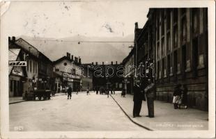 Ruttka, Vrútky; Husova ulica / utca, Jozef Hoffmann, L. Neumann üzlete, drogéria, Gargoyle Mobiloil benzintöltő állomás  / street view, shops, drugstore, gas filling station, petrol pump (EK)