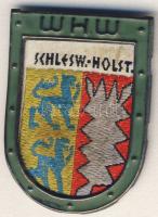 Német 3. Birodalom 1940-es évek "W.H.W. - Schlesw.-Holst. (Téli Segély Szolgálat) fém-szövet kitűző