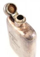 Ezüstözött, feliratozott fém italos palack, kulcs nélkül, jelzett, kis horpadásokkal, m: 21×12 cm