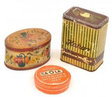 3 db régi vegyes fém doboz fedéllel, mind kopott: Julius Meinl kakaó, illusztrált, m: 14,5 cm. Szent István cikória, rózsákkal illusztrált, m: 7,5 cm. 1 db Baeder Caola vitaminos arc és bőrápoló krém, m. 3 cm, d: 9,5 cm.