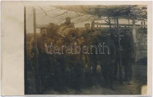 WWI German military, artillerymen with cannon. photo (small tear)