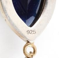 Aranyozott ezüst(Ag) foglalatos féldrágakő, jelzett, gumírozott karkötő résszel, bruttó: 9 g