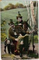 1909 Hunter and huntress with prey and rifles (EK)