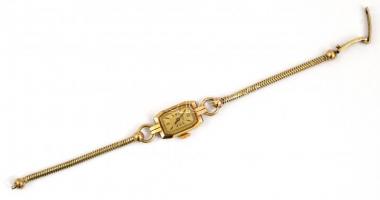 14 K arany (Au) Doxa női karóra 14 K arany szíjjal. Jelzett, működőképes. 70x34 mm, bruttó 20,82 g