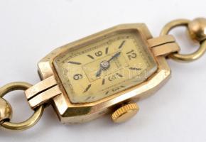 14 K arany (Au) Doxa női karóra 14 K arany szíjjal. Jelzett, működőképes. 70x34 mm, bruttó 20,82 g