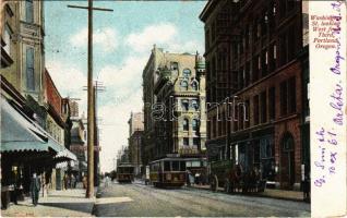 1910 Portland (Oregon), Washington Street looking West from Third, trams, drugstore, shops. E Pluribus Unum Oregon Series No. 486. (EK)