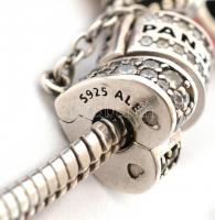 Ezüst(Ag) karkötő, 7 db charmmal, Pandora jelzéssel, h: 15,5 cm, bruttó: 27,9 g