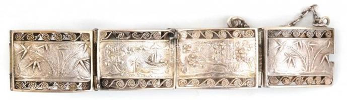 Ezüst(Ag) filigrán díszítésű karkötő, mintás ívelt tagokkal, jelzéssel, d: 6 cm, nettó: 25,9 g