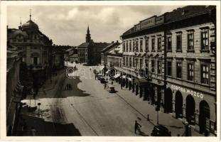 Miskolc, Széchenyi utca, Hotel Korona szálloda, Korona Mozgó (mozi), üzletek, Rex utcai üzemanyag állomás, automobil, kerékpár