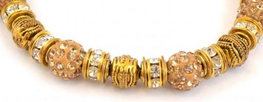 Aranyszínű karkötő, állítható hosszúság, díszdobozban