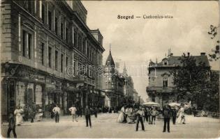 1913 Szeged, Csekonics utca, piac, Étterem a Kék Csillaghoz, bank és váltó üzlet, Eredeti Singer varrógépek