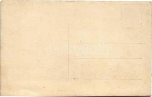 Vintage automobile with chauffeur and dog. photo