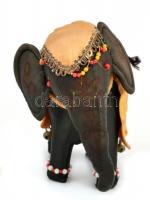 Elefánt, műszál borítással, díszes öltözetben, ormánya javított, lábainál kopásnyomokkal, m: 16 cm
