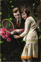 1931 Romantic couple with tennis racket. R.P.H. 7267/5.
