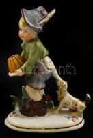 Fiú kutyával, porcelán figura, jelzett német (Germany), formaszámmal, kézzel festett, minimális lepattanással a fűszálak hegyén, m: 14,5 cm