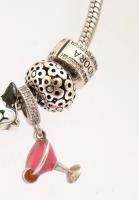 Ezüst(Ag) karkötő, 7 db charmmal, Pandora jelzéssel, h: 16,5 cm, bruttó: 28,6 g