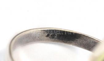 Ezüst(Ag) lapis lazulival díszített gyűrű, jelzett, méret:  57, bruttó: 7,9 g