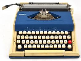 cca 1970 Abc műanyag írógép, eredeti tokjában, kissé kopott, összességében jó állapotban + 5 db írógépszalag/  Typewriter, plastic, in original box, with some wear