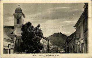 Huszt, Chust, Khust; Fő tér, háttérben a vár, templom, Timkó József üzlete. Knoll foto / main square, castle, church, shops (fl)