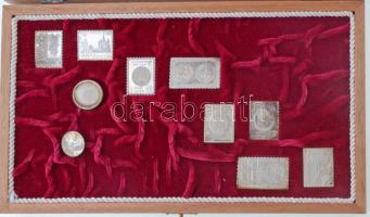 1979-1980. Az Állami Pénzverő által kiadott teljes ezüst (0.835) bélyegérem gyűjtemény a szovjet-magyar közös űrrepülés, a nemzetközi gyermekév, az első magyar aranypénz, és a moszkvai Olimpia témakörében, fa dísztokban (8xklf) és egy kitűző, mely hibás T:1- (eredetileg PP) patina