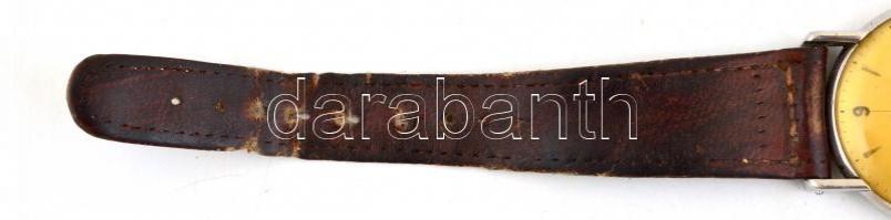 Solvil mechanikus karóra, kissé kopottas bőr szíjjal, működik, mutatói rozsdásak