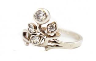 Ezüst(Ag) virágmintás gyűrű, fehér kövekkel, jelzett, méret: 54, bruttó: 2,23 g