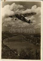 1931 Budapest. Magyar Légiforgalmi rt. reklámlapja. A Magyar Légiforgalmi Rt. új Fokker F-VIII típusú, H-MFNA lajstromjelű, 15 üléses repülőgép (1928-ban ezt a repülőgépet vitéz Háry László I. világháborús vadászpilóta Amsterdamból Mátyásföldre repülte) / Travel by Air! (EK)