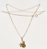 Ezüst(Ag) nyaklánc, oroszlános medállal, benne borostyán kővel, jelzett, h: 45 cm, medál: 1,5x1,5 cm...