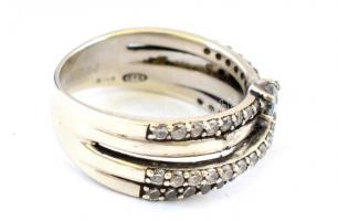 Ezüst(Ag) gyűrű, sok apró kővel, jelzett, méret: 54, bruttó: 4,83 g