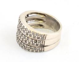 Ezüst(Ag) széles masszív gyűrű, sok apró kővel, jelzett, méret: 48, bruttó: 7,14 g