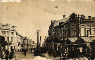 WWI military aircraft above a city. photo (fa) (non PC)