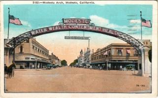 1936 Modesto (California), Modesto Arch "Water, Wealth, Contentment, Health" motto, American flag, automobile