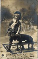 1909 Child with Dachshund dog on a sled, winter sport (fl)