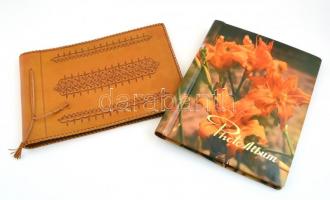 2 db érintetlen fotóalbum; egyik tokban, másik díszes bőrkötésben.