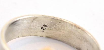 Ezüst(Ag) gyűrű türkiz kővel, jelzett, méret: 53, bruttó: 5,98 g