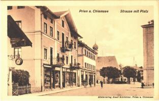 Prien am Chiemsee, Strasse mit Platz / street view, shops. Josef Schlichter