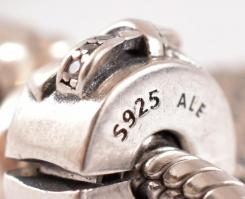 Ezüst(Ag) karkötő, 6 db charmmal, Pandora jelzéssel, h: 15 cm, bruttó: 25,68 g