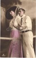1913 Romantic couple at the tennis court, tennis racket (Rb)