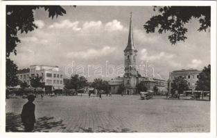 Érsekújvár, Nové Zámky; Fő tér, villamos, templom, bank. Sch. T. kiadása / main square, tram, church, bank