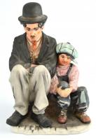 Poema Artistic porcelain Emil Cretu: Chaplin és A kölyök, festett bisquit porcelán, jelzett, kis kopással, m:25 cm