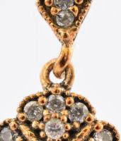 Aranyozott ezüst(Ag) virágos, kövekkel gazdagon kirakott fülbevalópár, jelzett, h: 3,5 cm, bruttó: 9...