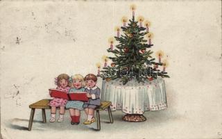 1922 Christmas greeting card, children by the Christmas tree. W.S.S.B. 1955. (EK)