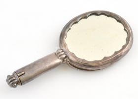 Ezüst(Ag) kézi tükör, hátoldalában púdertartóval, nyelében rúzstartóval, jelzett, 14,5×6,5 cm, bruttó: 122,2 g
