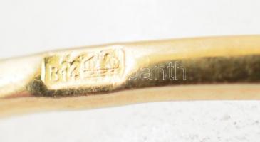 Arany (Au) 14K gyűrű, 55 db brill kővel (összesen cca 0,275 ct) jelzett, méret: 52, bruttó: 1,4 g