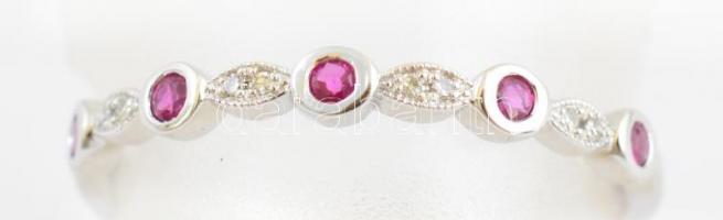 Arany (Au) 14K gyűrű, brill és rubint kövekkel, a 8 brill cca 0,04 ct, az 5 rubint összesen cca 0,25 ct, jelzett, méret: 57, bruttó: 1,4 g