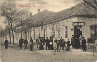 Nagybecskerek, Zrenjanin, Veliki Beckerek; utca, Szauer Árpád üzlete, M. kir. dohánytőzsde, magyar címer. Photogr. Oldal / street view, shop of Szauer, tobacco shop, Hungarian coat of arms (EK)