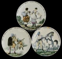 XIX. század vége: Magyar népviseletek XVIII. sz. kézzel festett fajansz dísztányér sorozat 3 db, d: 20 cm Formaszámmal. Egyiken lepattanással.